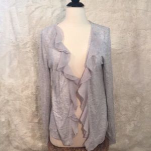 Open in the front goes over another shirt